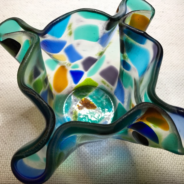 #12806 BBGArt  $240.00  DescriptionL Glass fluted bowl/candle holder (multi-colored) original design & engraved  Size: 7” round (slumped to 6-1/2”)  Item# 12806  $95.00
